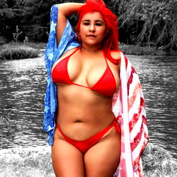 Alluring Marie's Melons: A Red-Headed Texas Swimsuit Model