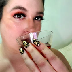 Analiesa enjoying a glass of red wine