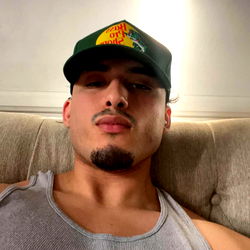 Couch-Resting Model in Fitness Tank Top