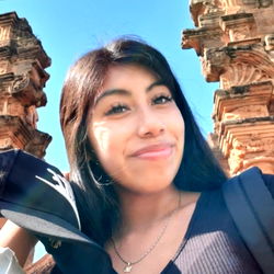 Aldana Soledad Posing at a Landmark