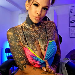 Tattooed Model with Colorful Bikini Top