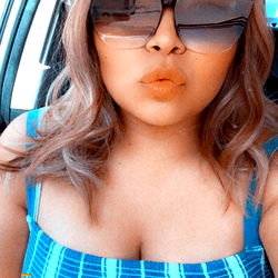 Mandy in a Chic Blue and White Outfit