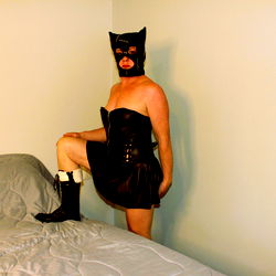 Female Dominating in Latex Leather and Boots