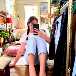 Person Taking Selfie in a Closet