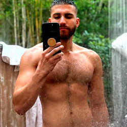 Fit and Shirtless Model in Bathroom