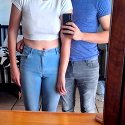 Modeling a casual outfit in a mirror