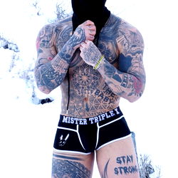 Ochoaalbert - The Tattooed Model Striking a Pose in the Snow