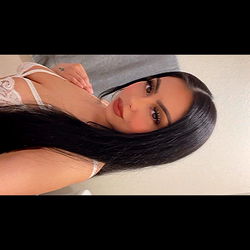 Gigi, an OnlyFans Model, Posing for a Captivating Selfie