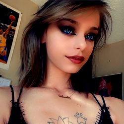 Fashionable OnlyFans Model with Stylish Blue Eyes