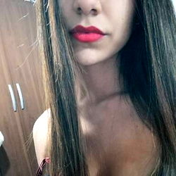 Onlyfans Model Aledreams94 with Red Lipstick and Bangs