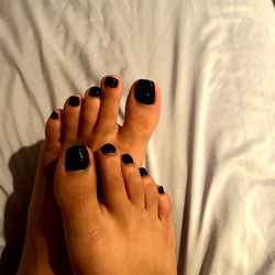 Angel Toes Showcasing Pedicure with Dark Polish