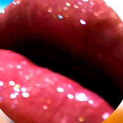 Latinabitch's Shimmering Lip Gloss Ad