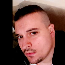 A Man in a Leather Jacket with a Mug