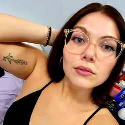 Stylish OnlyFans Model in Vintage Glasses