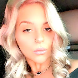 Belle on OnlyFans: Stylish Photoshoot with Tattoos and Hair Extensions