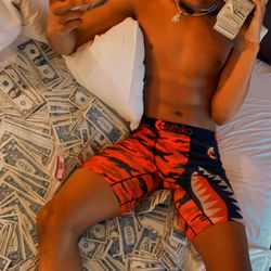 Sleeping model with OnlyFans link in image description