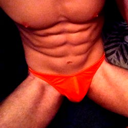 OnlyFans Model in Red Underwear Sitting on Chair