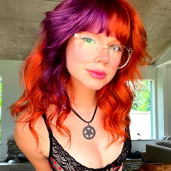 OnlyFans Model Foquinhaa Poses in Colorful and Confident Style