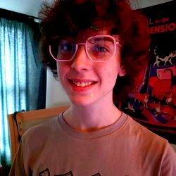 Emo Boy with Glasses and Tie-Dye Shirt