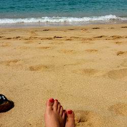 Serene beach vibes, with a sandy stroll and ocean waves in the background!