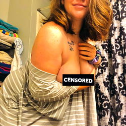 A Woman in a Striped Shirt