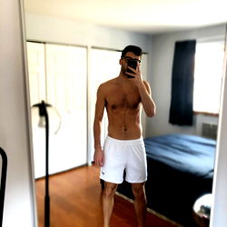 Aquaman IV in an open room with a mirror