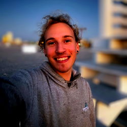 Young Adult Male Smiling at the Camera