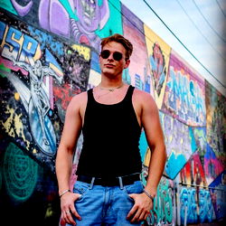 Model Allupinyaa in Front of Colorful Graffiti Wall