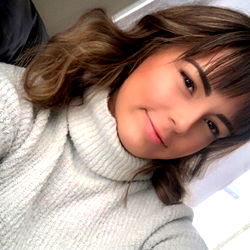 A young woman posing for a selfie