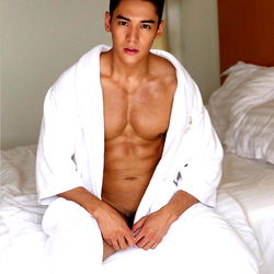 Fit Model in White Robe with Flexed Abs