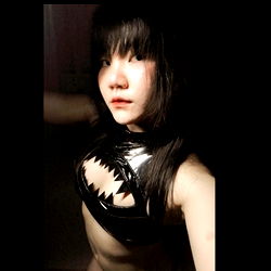 Female Model in Latex or Leather Outfit