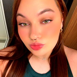 Gorgeous OnlyFans Model with Vibrant Hair and Radiant Smile