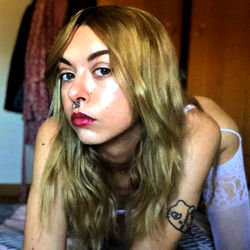 Model Pose in Lingerie and Tattoo