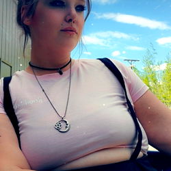 Alaska-Based Model in Colorful Outfit Sitting