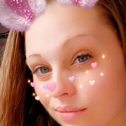 Omaha-Based Model Asuna Poses for Playful Easter Earrings Selfie