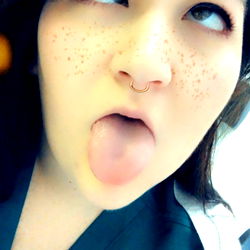 Sassy Nurse with Tongue Out in OnlyFans Post