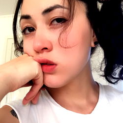 Onlyfans Model in Casual Attire, Exuding a Relaxed Vibe