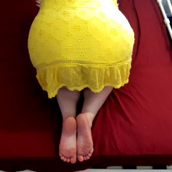 Vibrant, Lingerie-Wearing Model Posing in a Bed