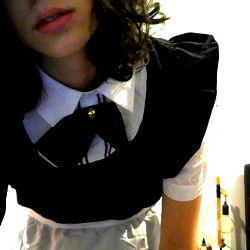 Winny, A Model Posing in Cosplay and Elegant Outfits