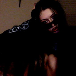 Female with long hair posing for Onlyfans