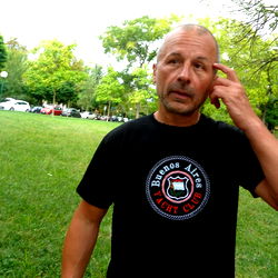 Man in Casual Wear Talking on Phone