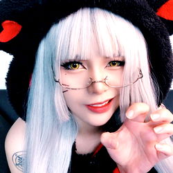 Anime Cosplayer in Cat Ears