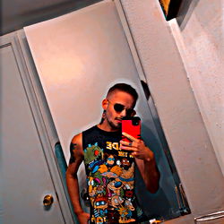 Man in Bathroom Mirror