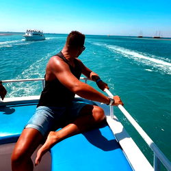 Model Marcel De Marly Posing On Boat