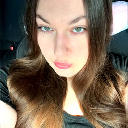 Long-haired beauty posing for selfie