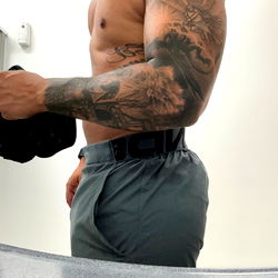 Tyrone, a Bodybuilder Posing in a Fitness Gym