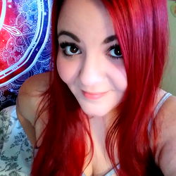 Cassie: A Vivid Red-haired Model