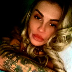 Model Photo with Tattoos and Sensual Pose,