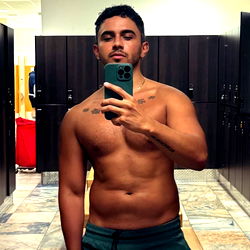 Jay, a Bodybuilder from Canada in a Gym Mirror