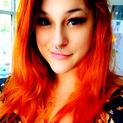 North Carolina model JadetheBabe704 with vibrant red hair and septum piercing